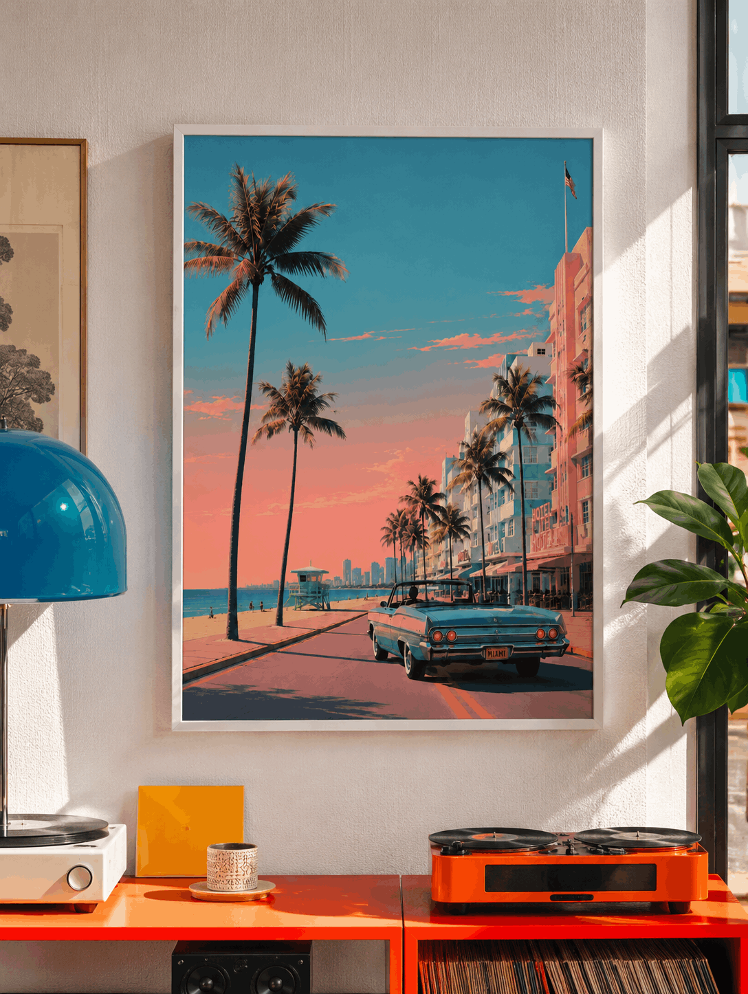 Framed wall art print of tropical palm avenue with teal vintage car and pink sky