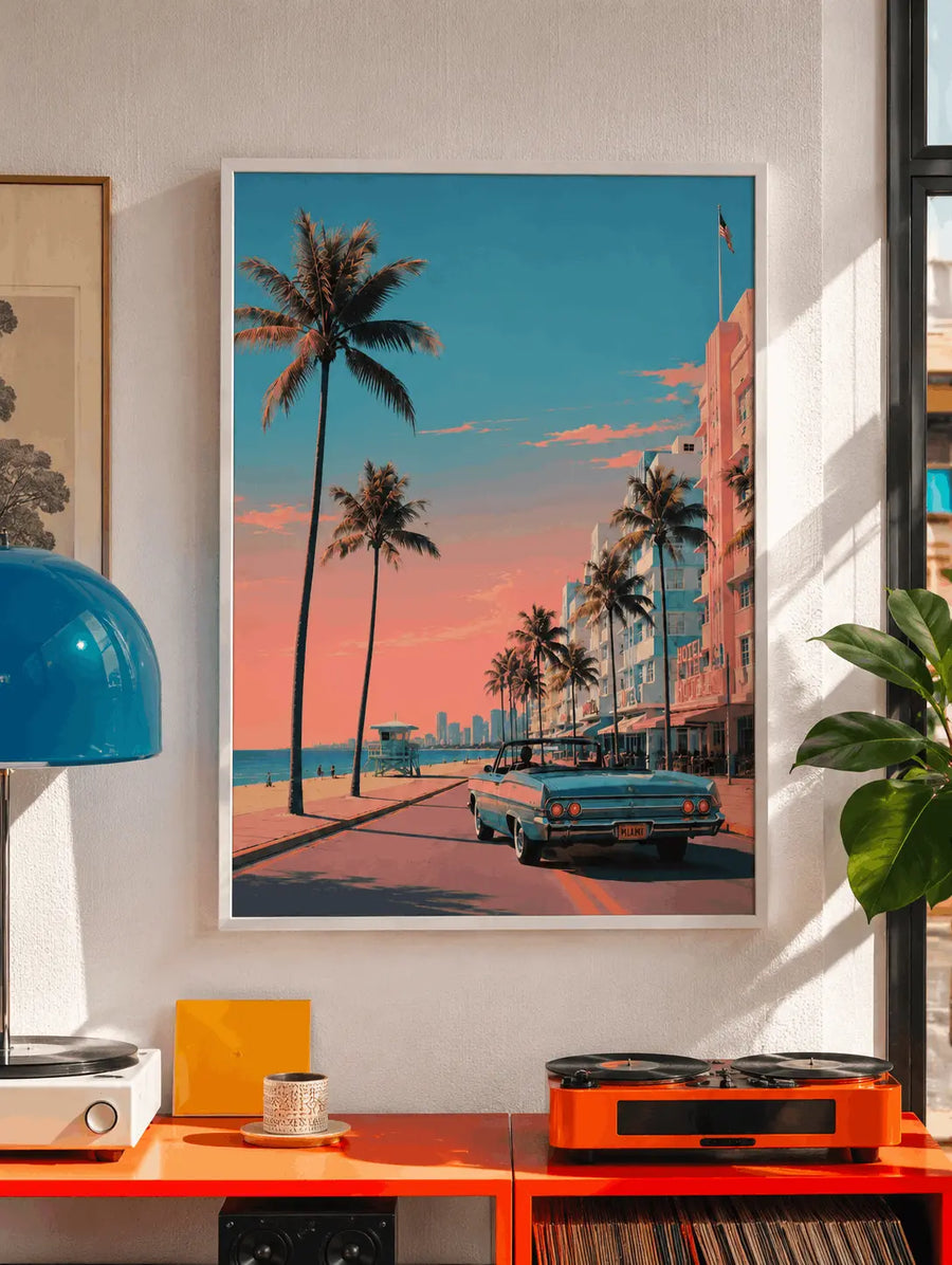 Framed wall art print of tropical palm avenue with teal vintage car and pink sky