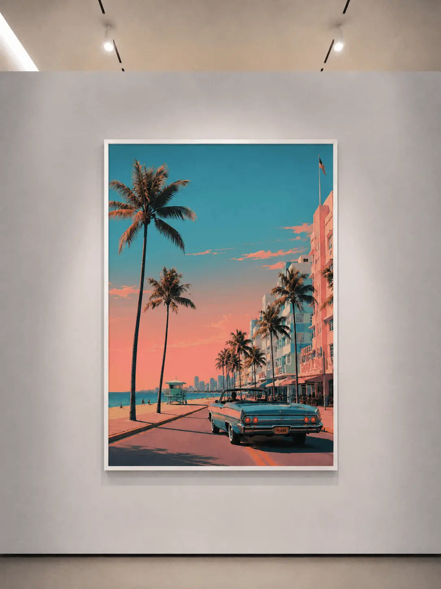 White-framed wall print featuring palm trees, pastel buildings, and teal vintage car