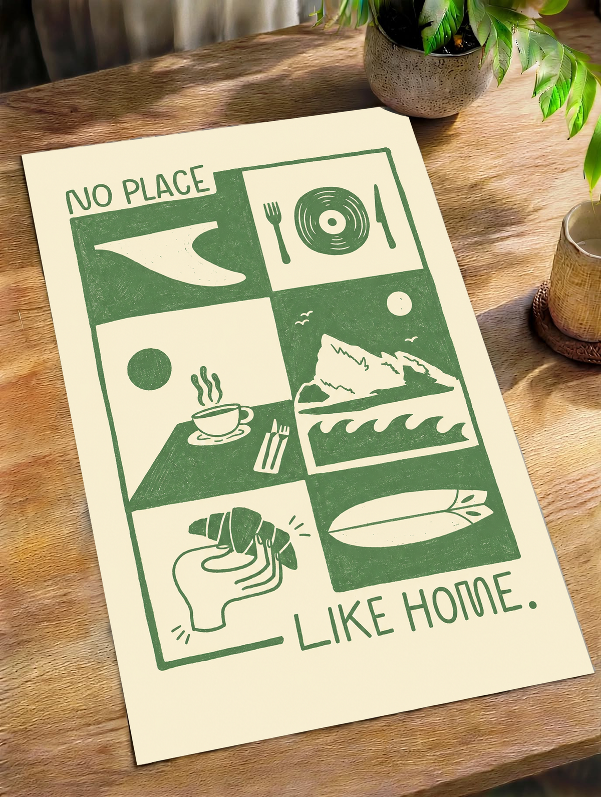 Green-and-cream “NO PLACE LIKE HOME” art print with graphic utensil and landscape blocks