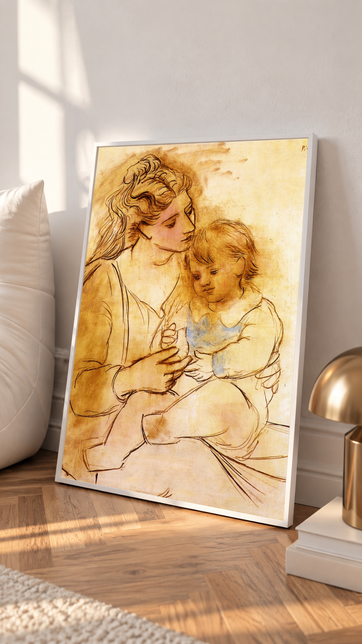 1. Fine brown outlines trace swept-back hair and overlapping hands in the Picasso Mother and Child Print, with pale blue clothing accents breaking up the warm cream and golden background around the seated figures.