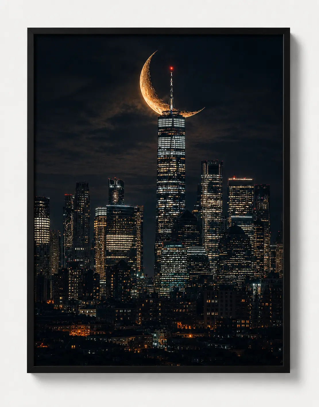 Framed city skyline print with golden crescent moon over skyscrapers, black frame
