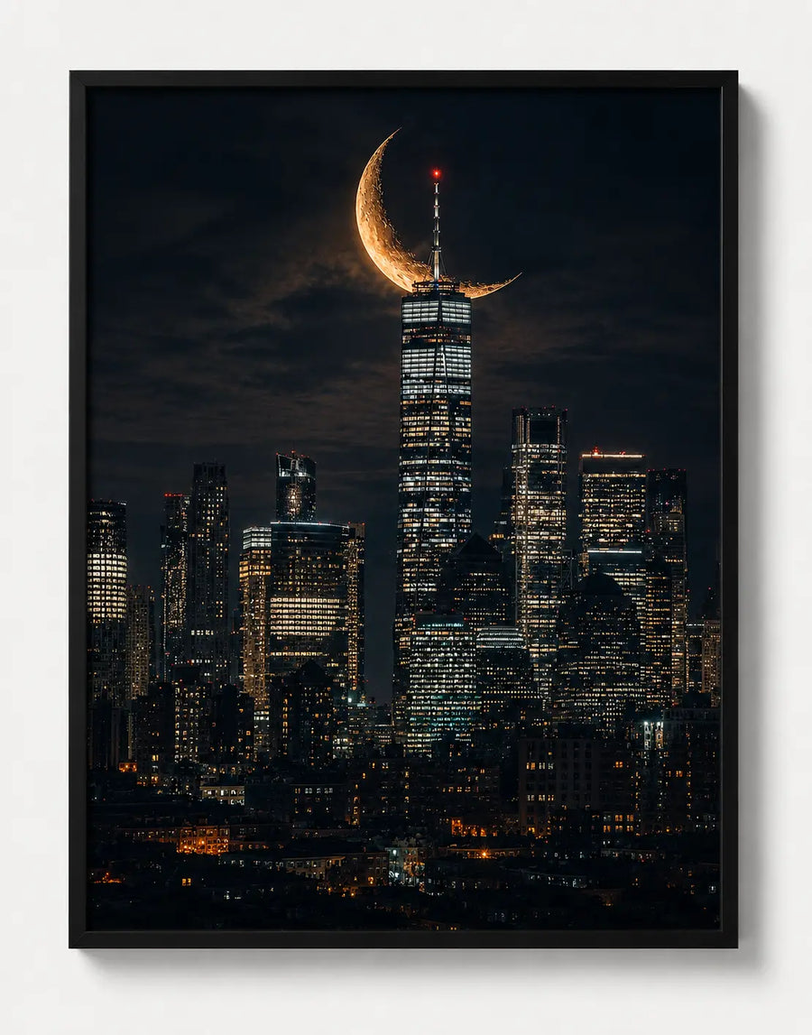 Framed city skyline print with golden crescent moon over skyscrapers, black frame