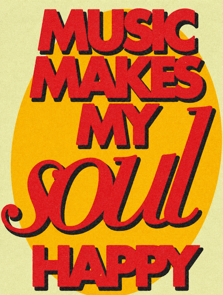 Close-up of music quote print text on yellow background with red and black letters.