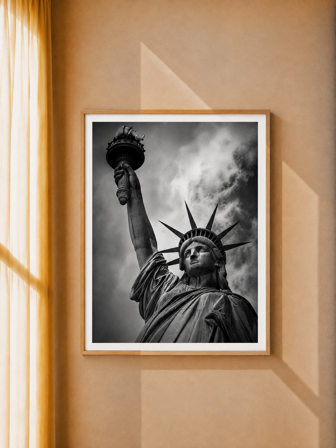 Statue of Liberty Art Print displayed in a black frame within a warm contemporary living space