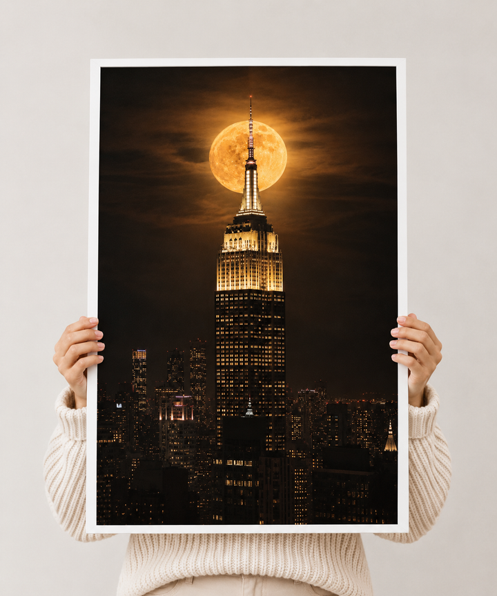 Framed Empire State Building Moon Print displaying New York City's iconic skyline under a luminous moonlit sky.