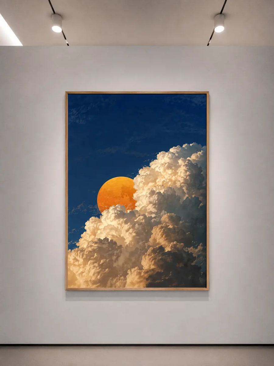 alt
Impresión de arte mural con marco blanco que muestra cielo azul con nubes y un resplandor dorado de eclipse