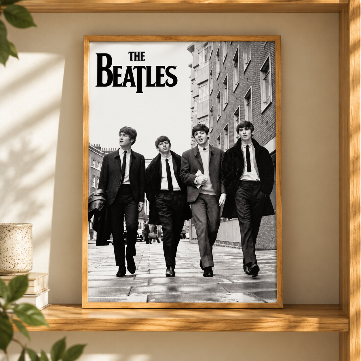 The Beatles Black and White Music Legends Poster displayed in a thin natural oak frame in a warm modern interior
