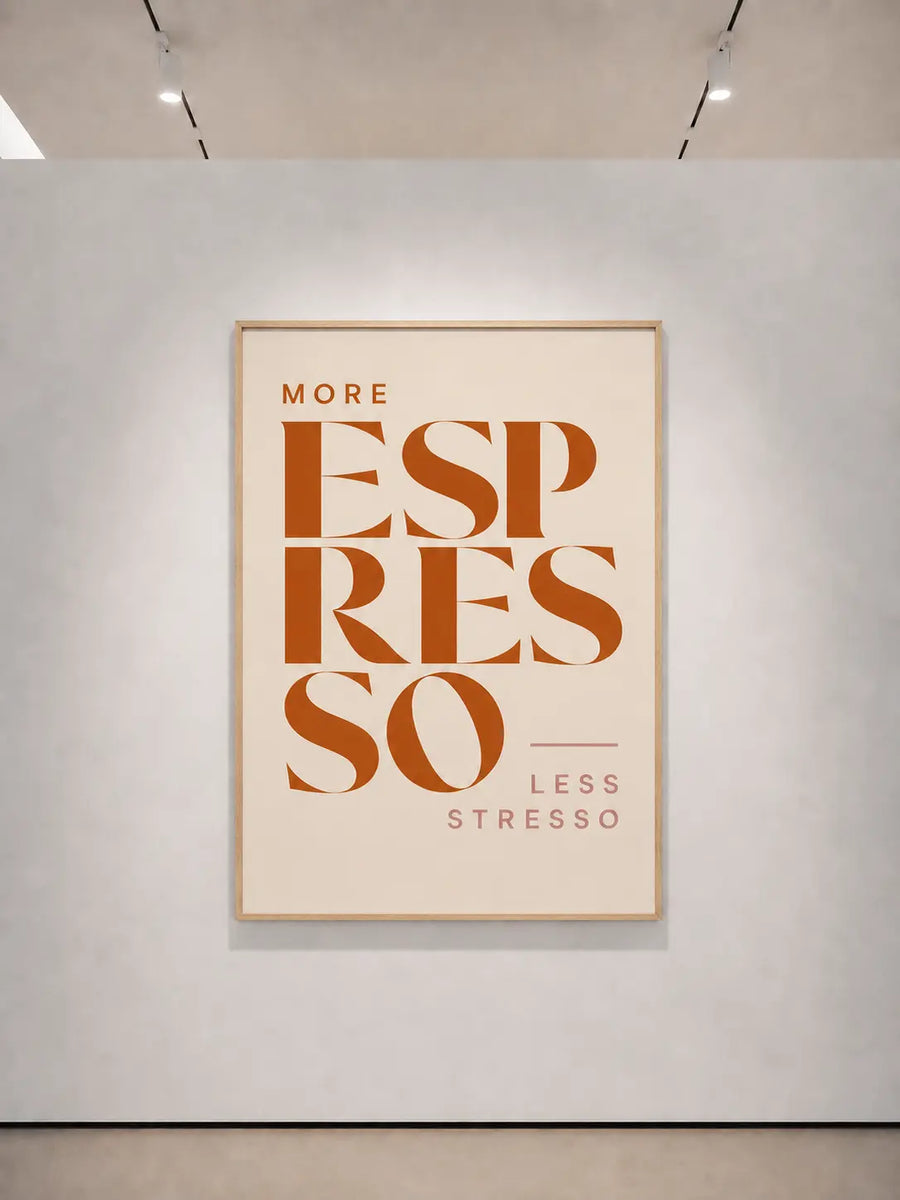 Oak-wood framed print with orange typographic text on a light background