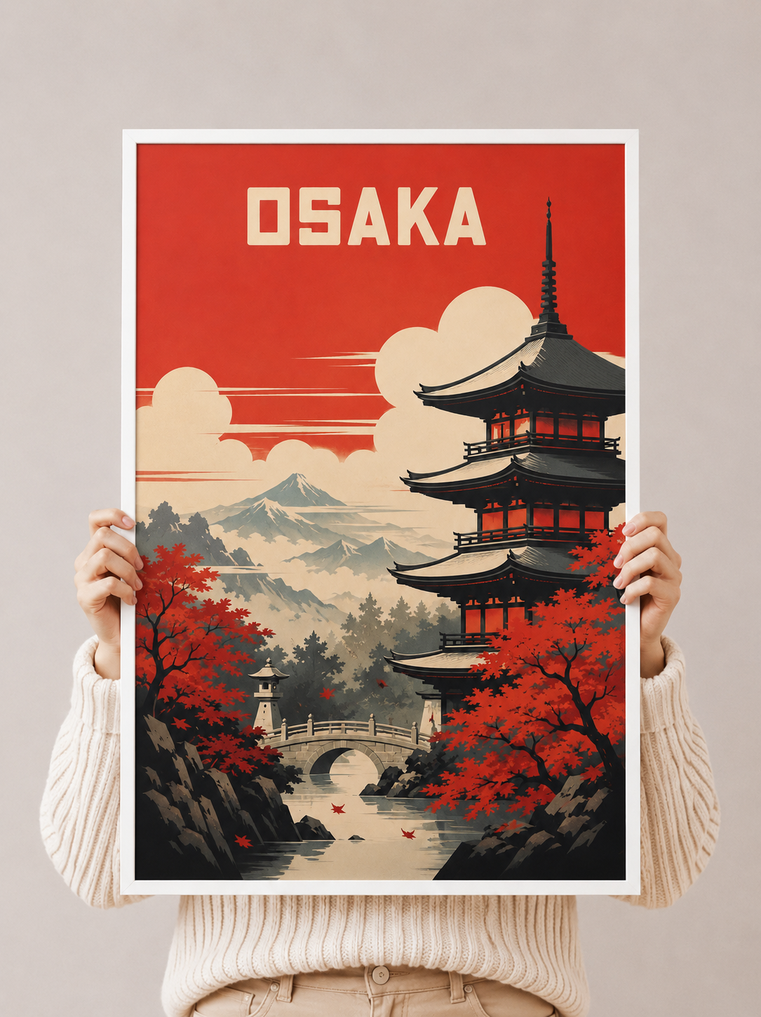Osaka art print poster held by hands, red background with pagoda, Mount Fuji, autumn trees