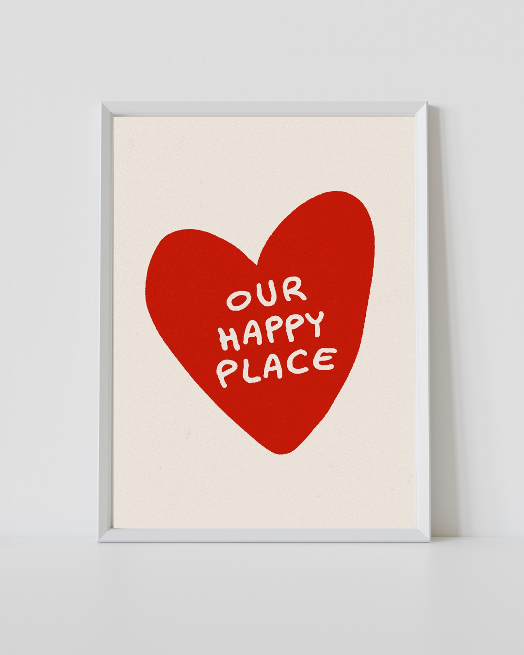 Romantic heart print in a white frame with red hearts and “Our Happy Place” text