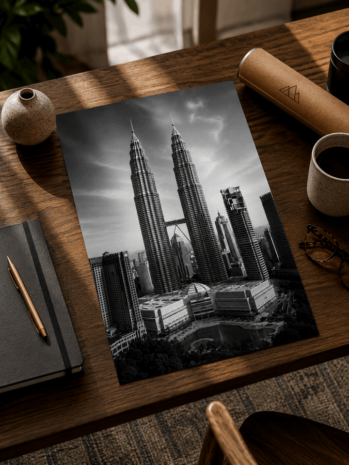 Black-and-white skyline poster with twin towers, viewed from an angle