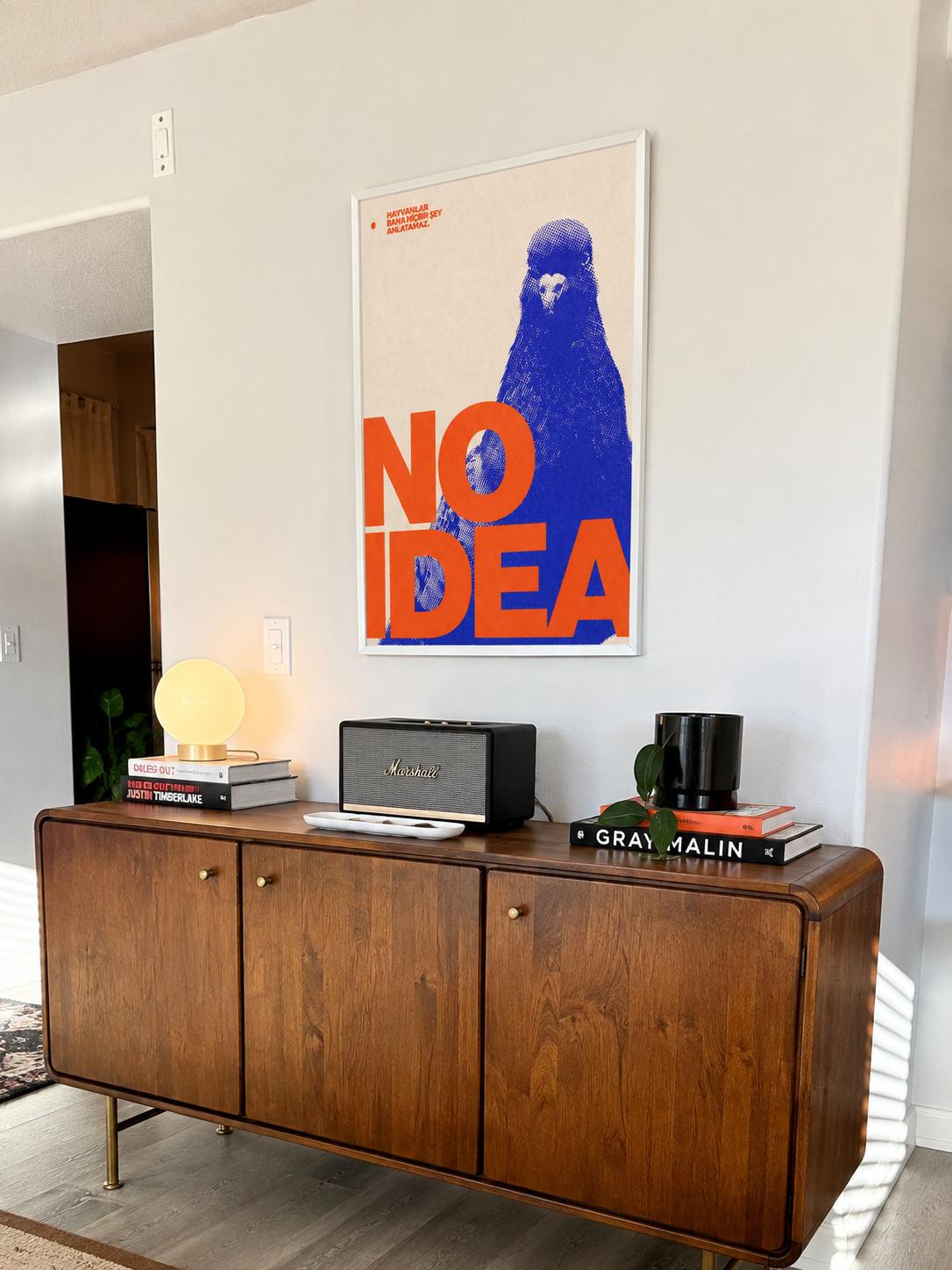 Blue pigeon pop art print with red "NO IDEA" text, silver frame