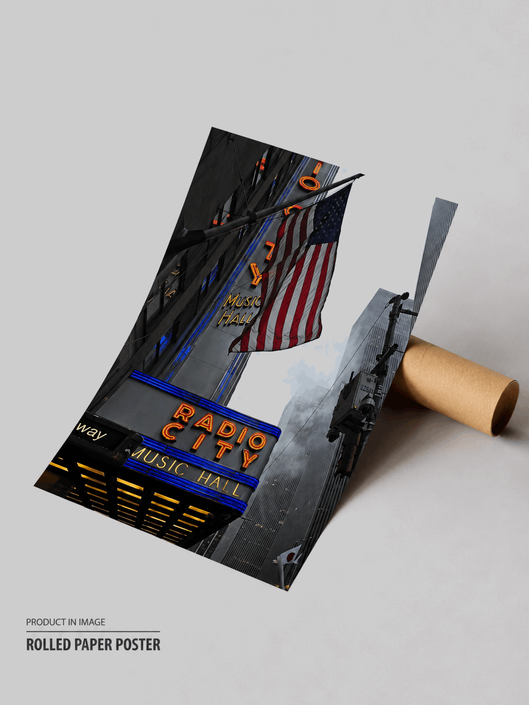 Rolled black travel poster with Radio City and US flag street scene