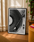 Vinyl record photo art print in black frame with dark vinyl and silver tonearm