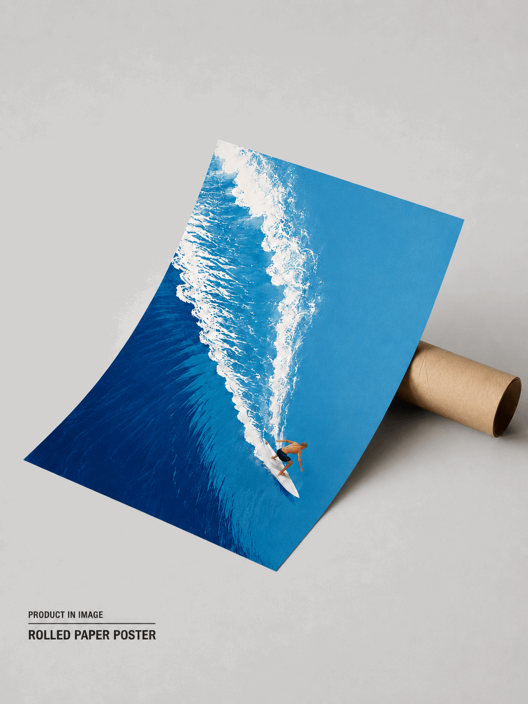 Rolled paper poster surf wall art with swimmer riding a blue ocean wave