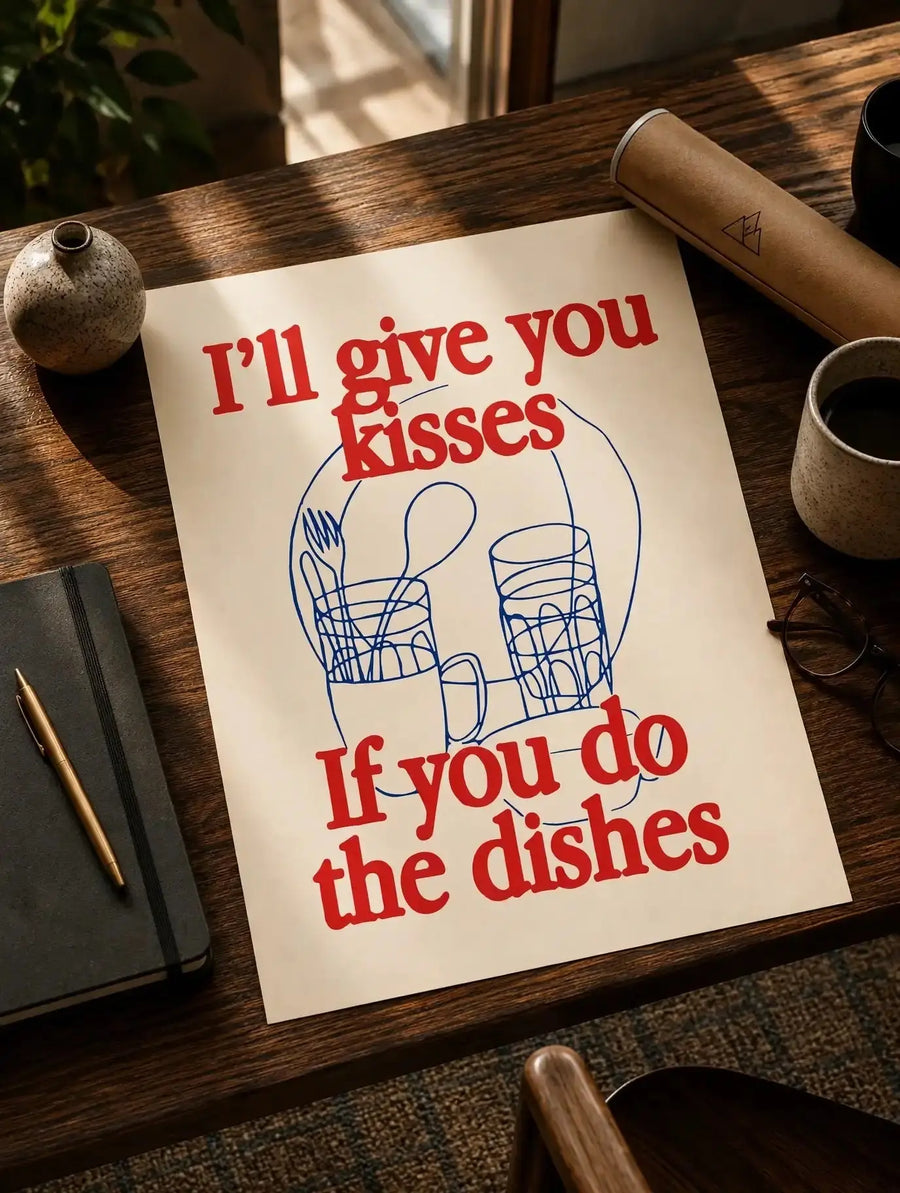 Unframed kitchen quote print on wooden table, red quote and blue dish sketch