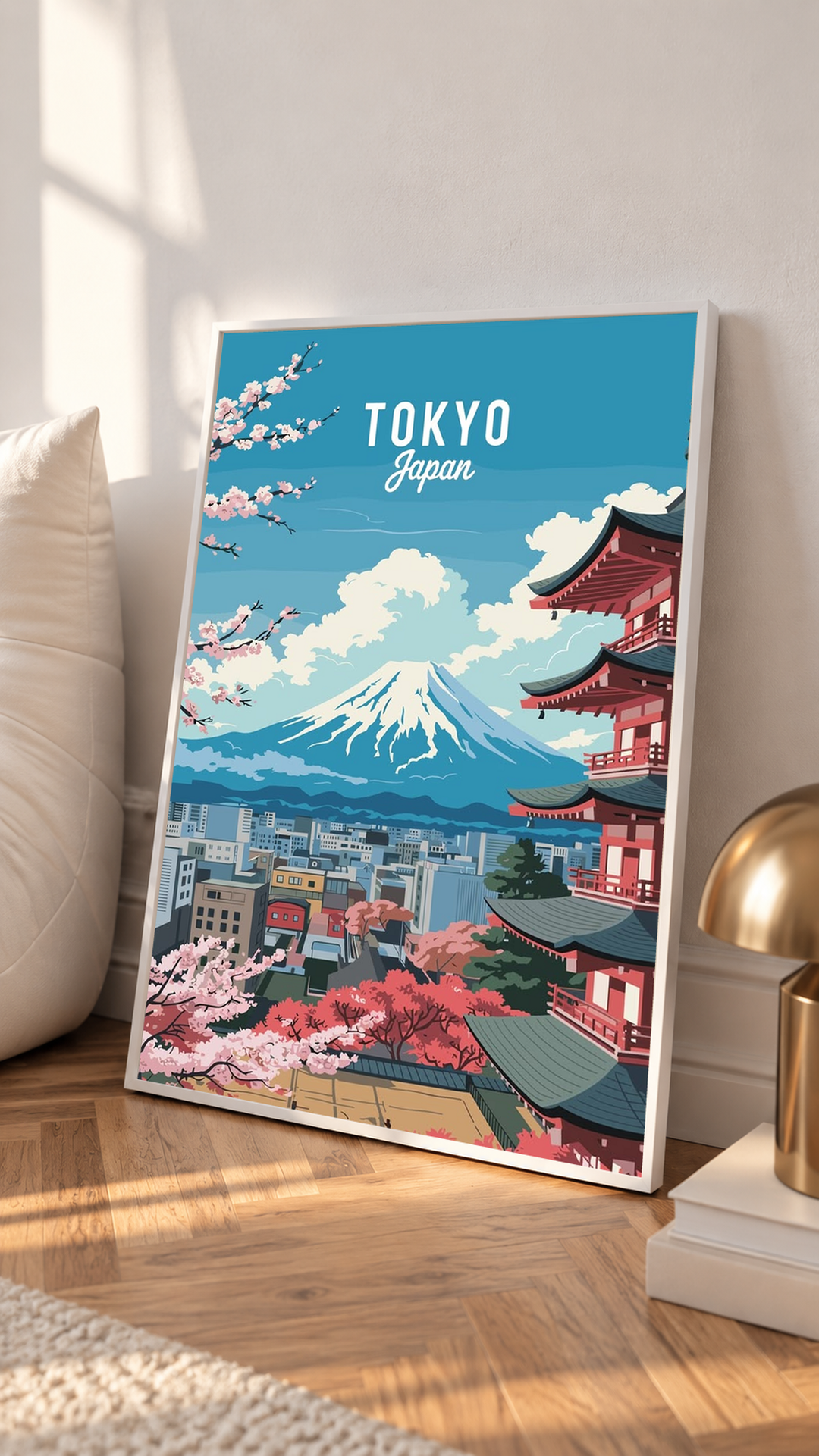 Framed wall art print standing on ledge with blue Tokyo skyline and Mount Fuji