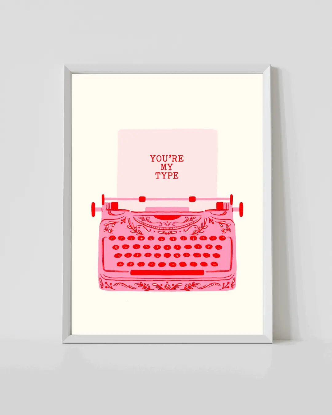 Typewriter print with red typewriter illustration and text, in white frame
