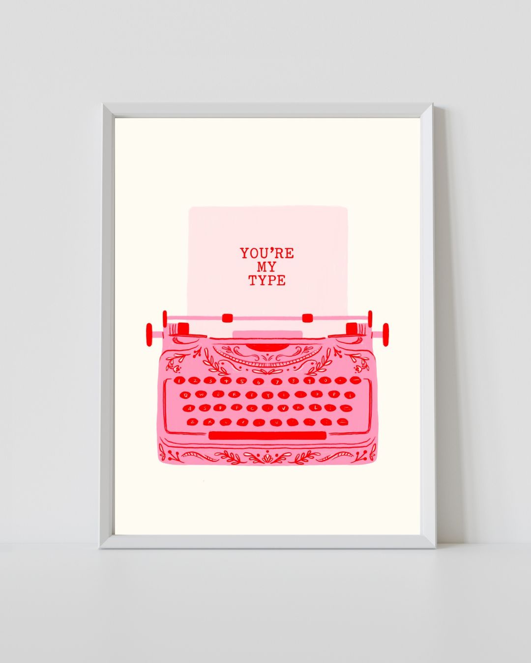 Typewriter Print featuring a vintage pink typewriter with the phrase "You're My Type" on a soft cream background.