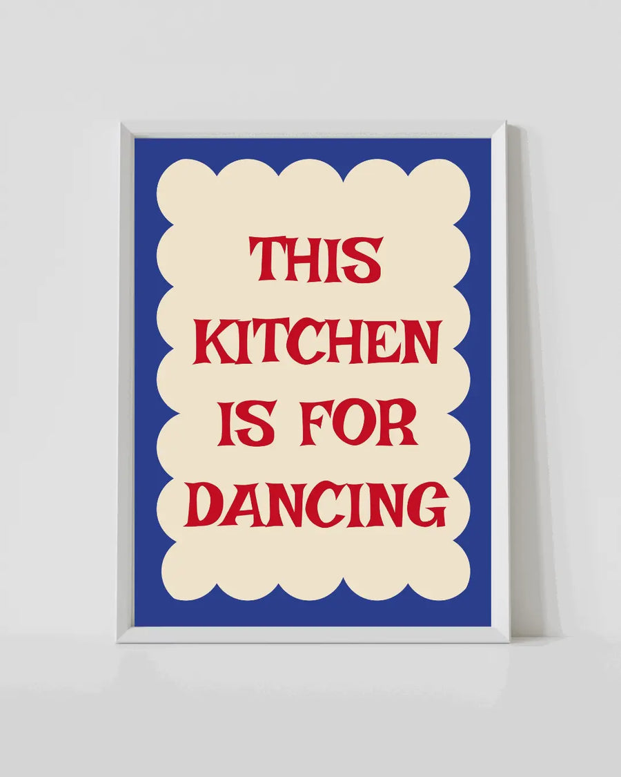 Kitchen quote print with blue background, cream scalloped panel, red lettering, white frame