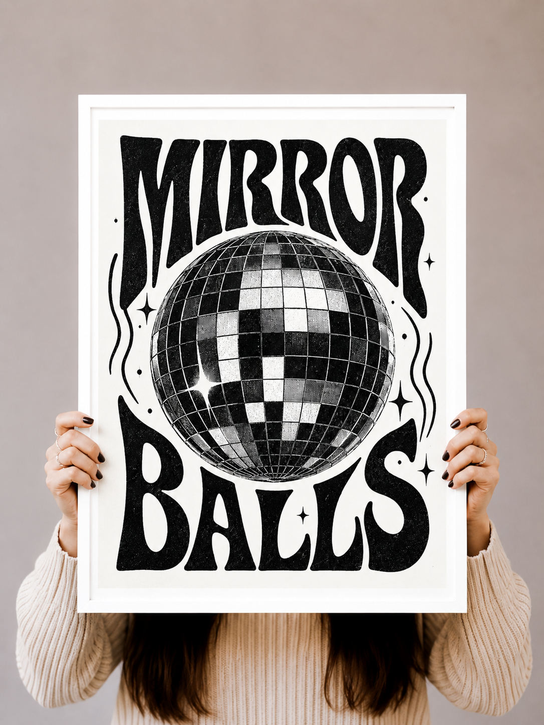 Mirror Ball Art Print displayed in a black frame within a warm modern living space