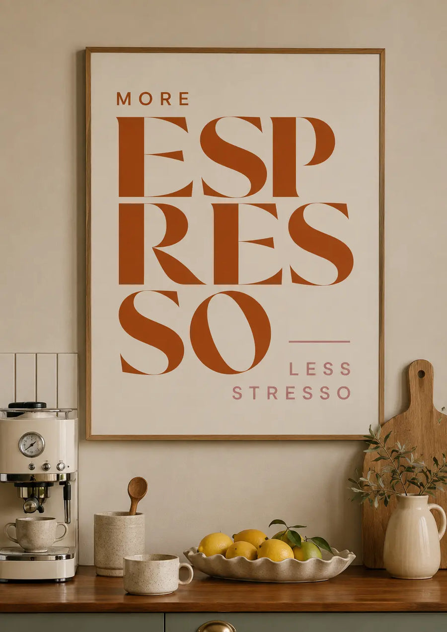 Oak-wood framed print with orange typographic text on a light background