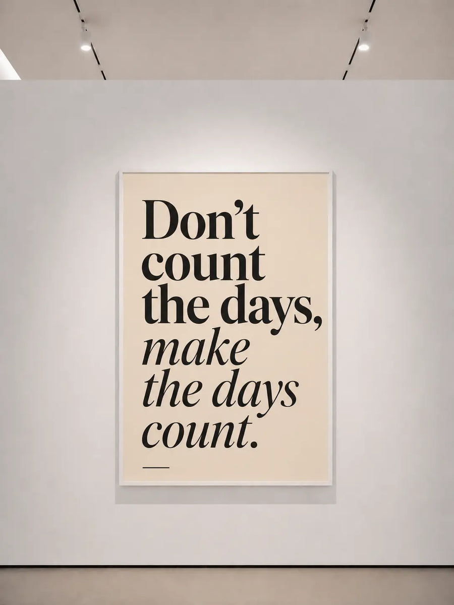 Impresión de arte mural con marco blanco y la frase “No cuentes los días, haz que los días cuenten.”