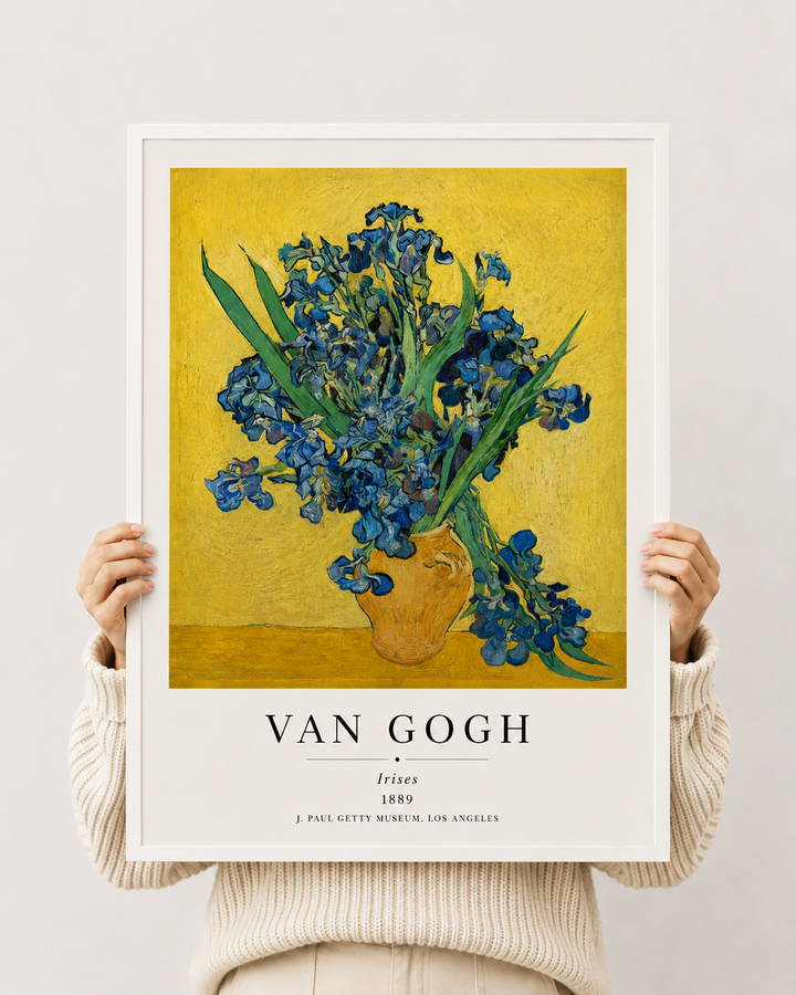 Van Gogh Irises art print in white frame, blue flowers on yellow background