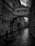 Black-and-white architecture artwork featuring arched bridge, canal water, and gondola