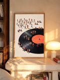 Framed retro vinyl record people wall art with orange center label and crowd