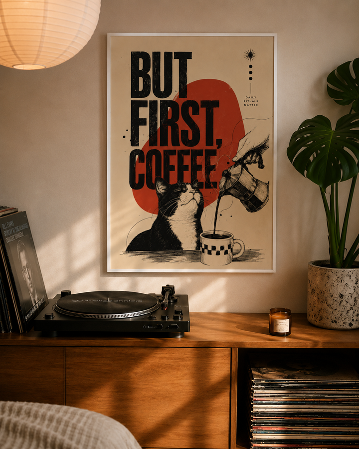 White-framed wall art poster with 'But First Coffee' design, cat, and coffee jug