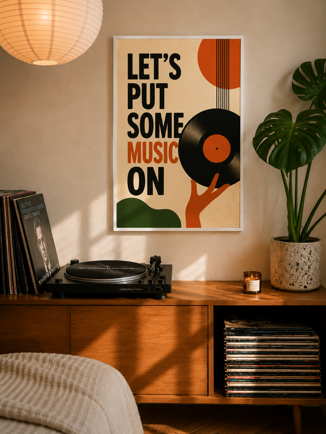 Framed music-themed paper poster with vinyl record graphic and "LET'S PUT SOME MUSIC ON"