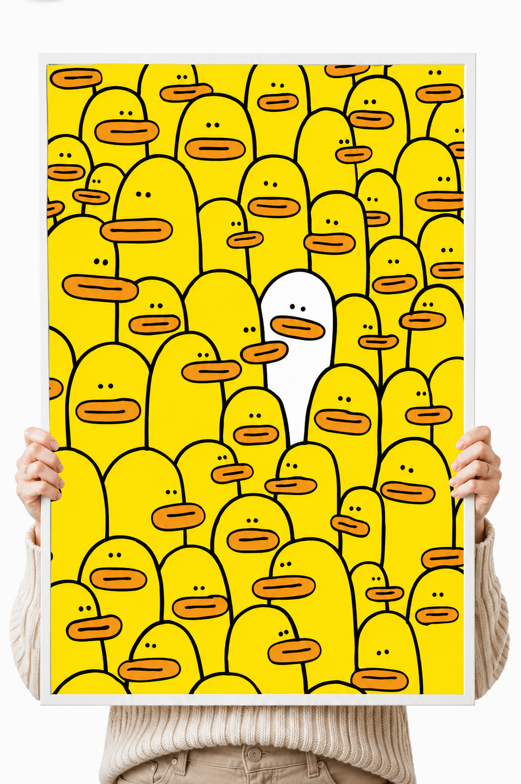 Yellow character-face pattern poster being held by hands.