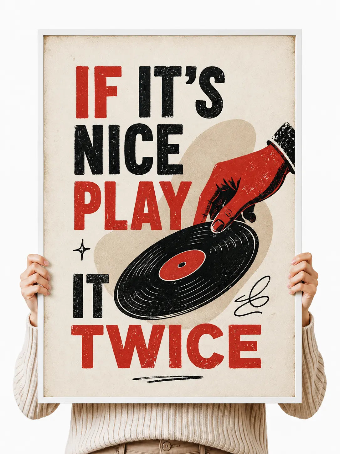 Vinyl record wall art poster held up, showing red and black “If It’s Nice Play It Twice”
