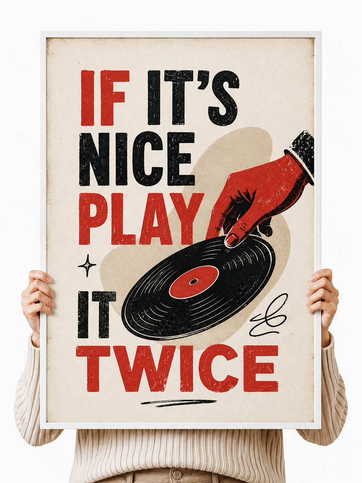 Vinyl record wall art poster held up, showing red and black “If It’s Nice Play It Twice”
