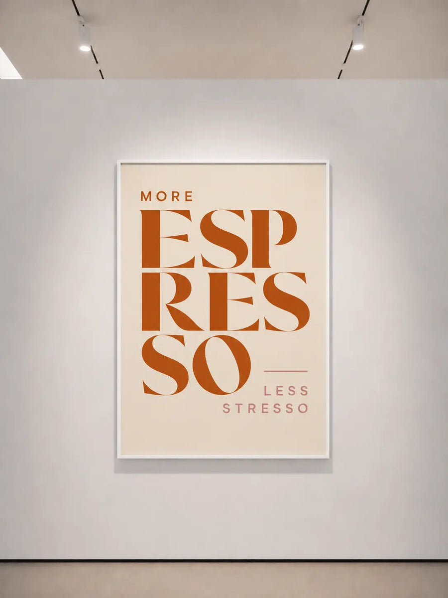 White-framed print with orange typographic text on a light background