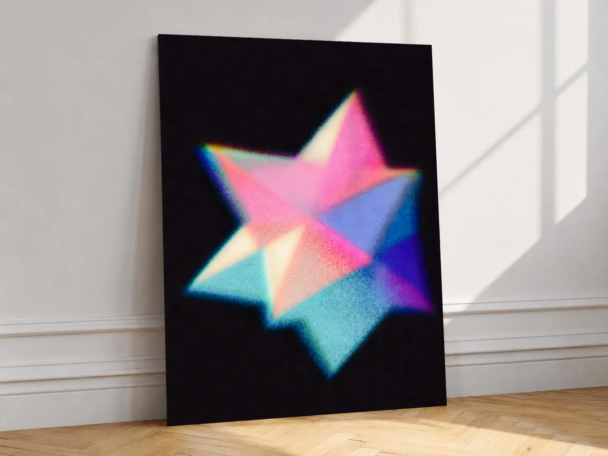 Overlapping pink cyan blue and purple geometric star shapes with grain and soft glow on black, shown unframed on a white wall above parquet flooring with a diagonal sun shadow