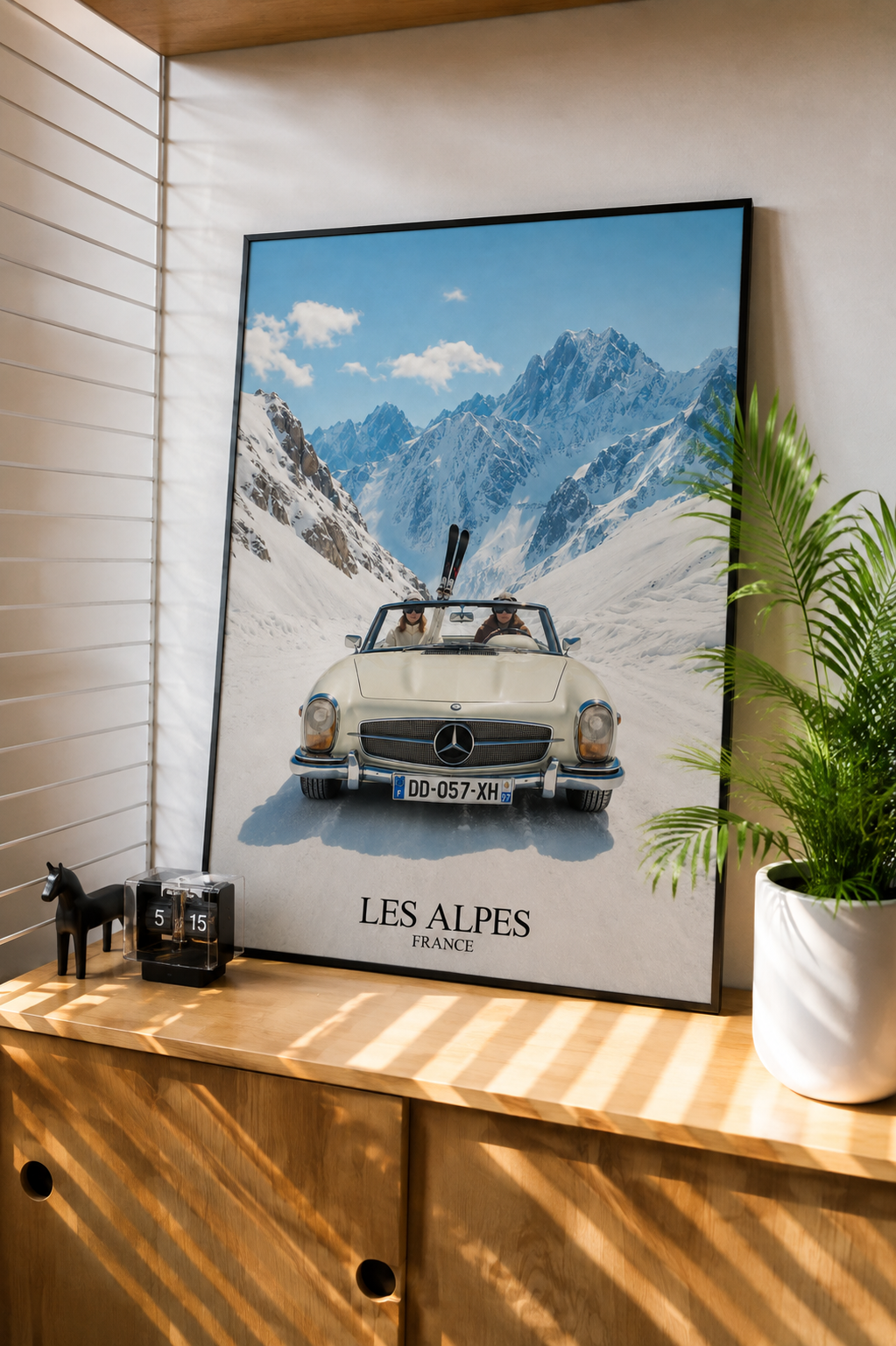 Alpine classic car travel poster styled in a modern interior