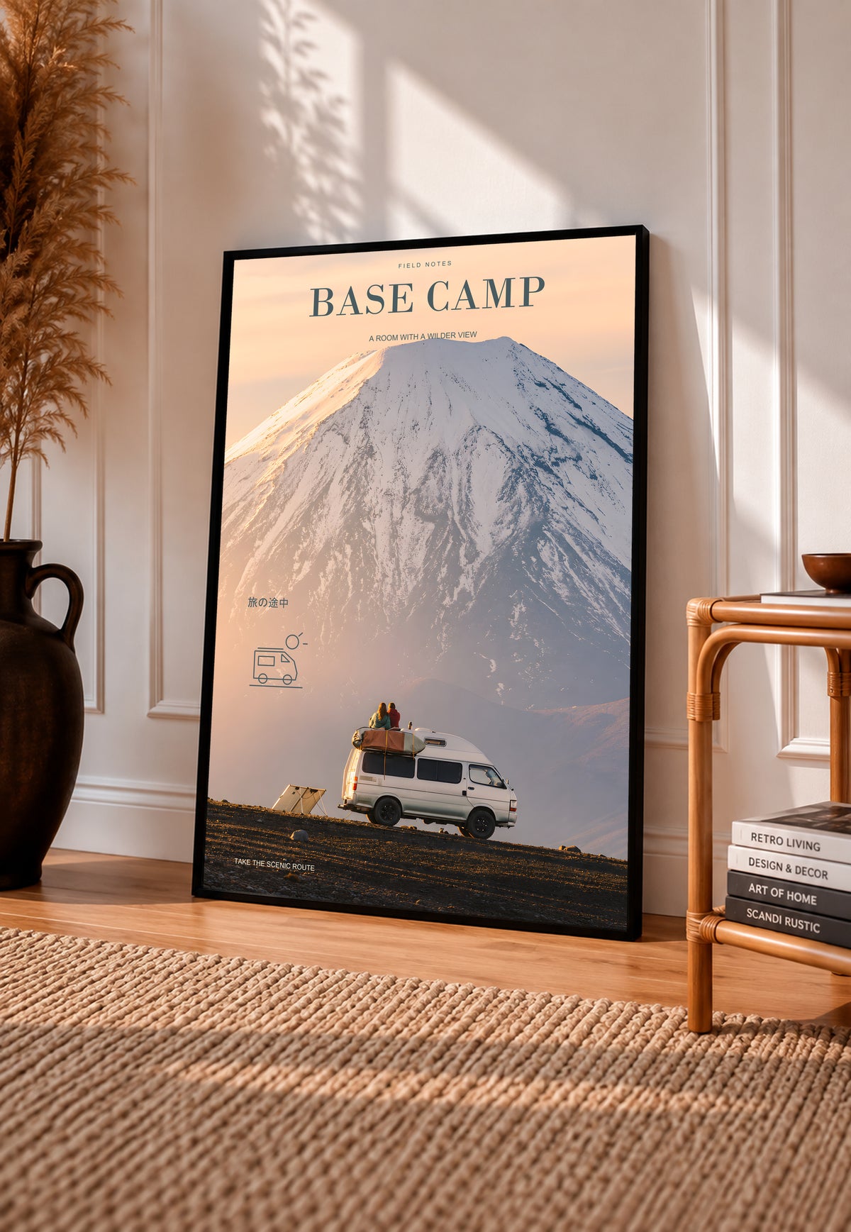 Black-framed Base Camp poster showing a camper van below a snowy mountain