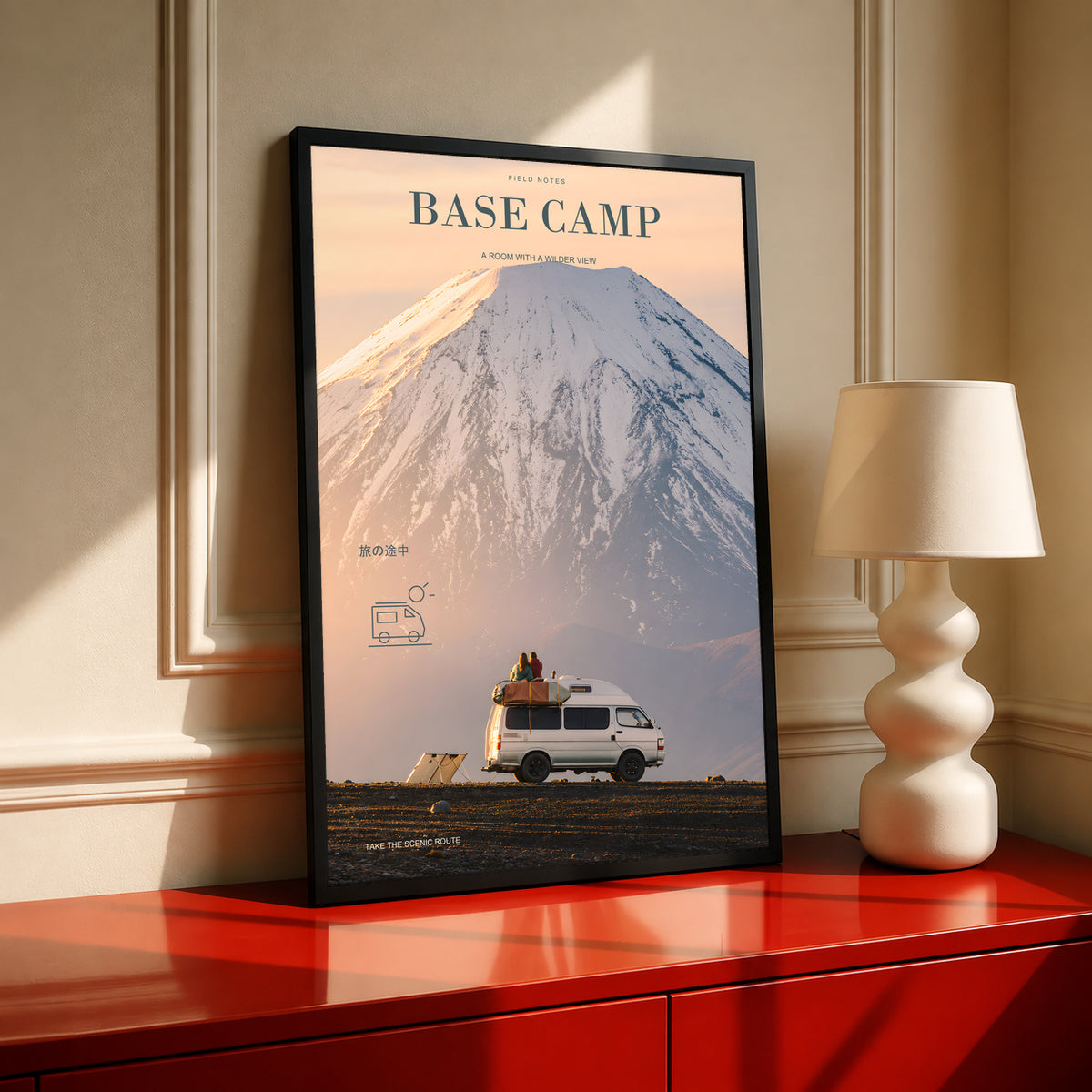 Base Camp camper van poster in a black frame, with a snowy mountain and van