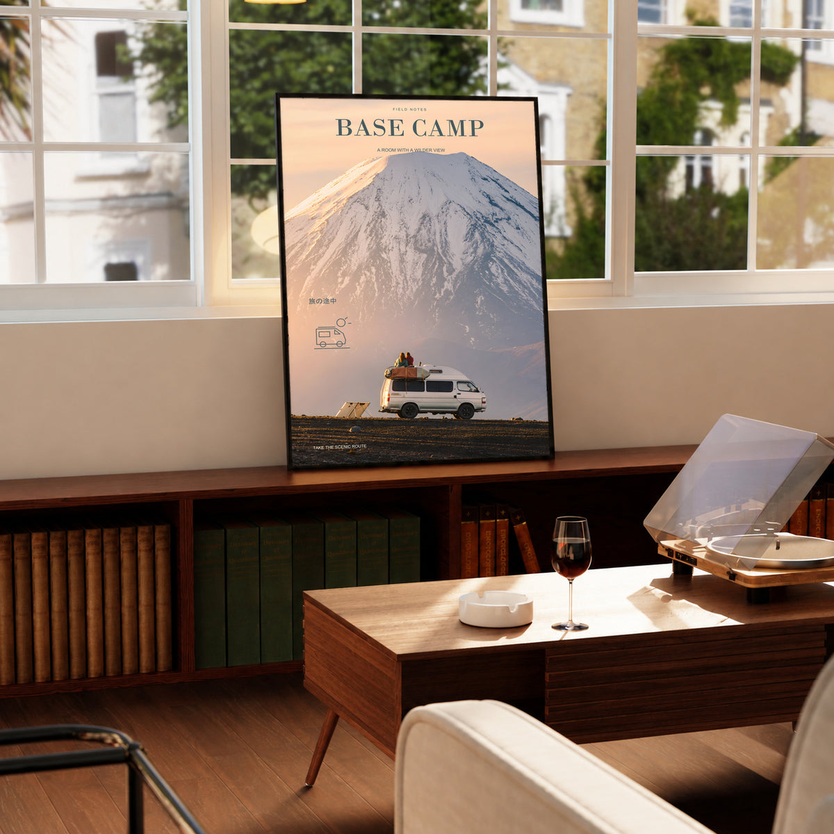 Framed Base Camp poster featuring a camper van against a snowy mountain