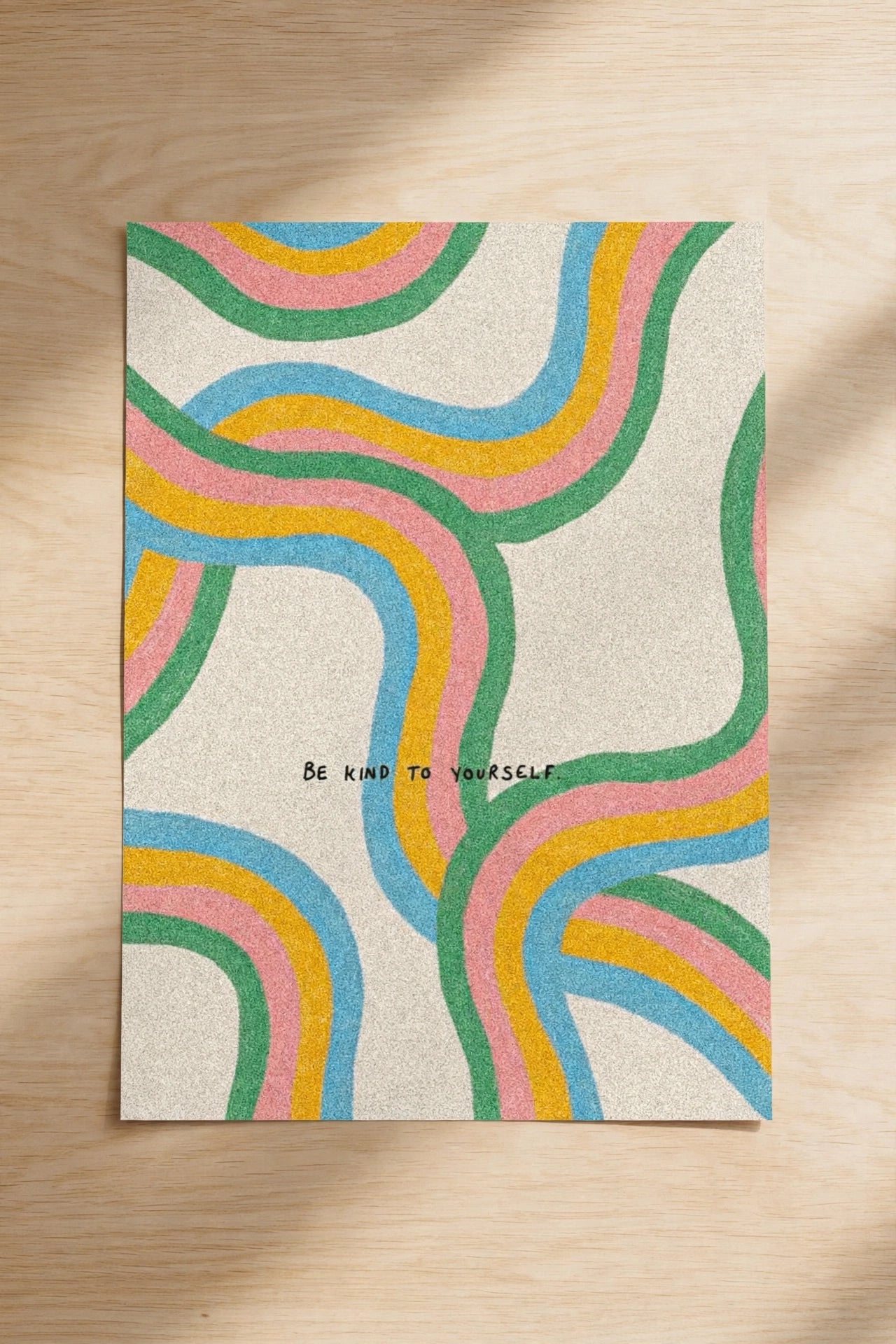 Be kind to yourself wall print with colorful wavy rainbow lines on off-white background