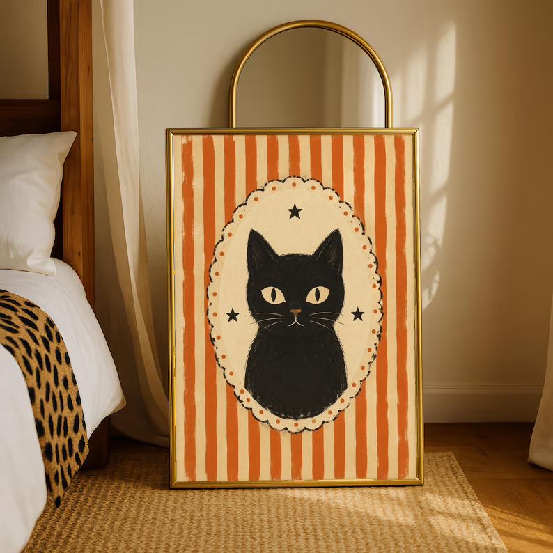 Gold-framed cat cameo poster with orange stripes and black cat in cream scalloped oval