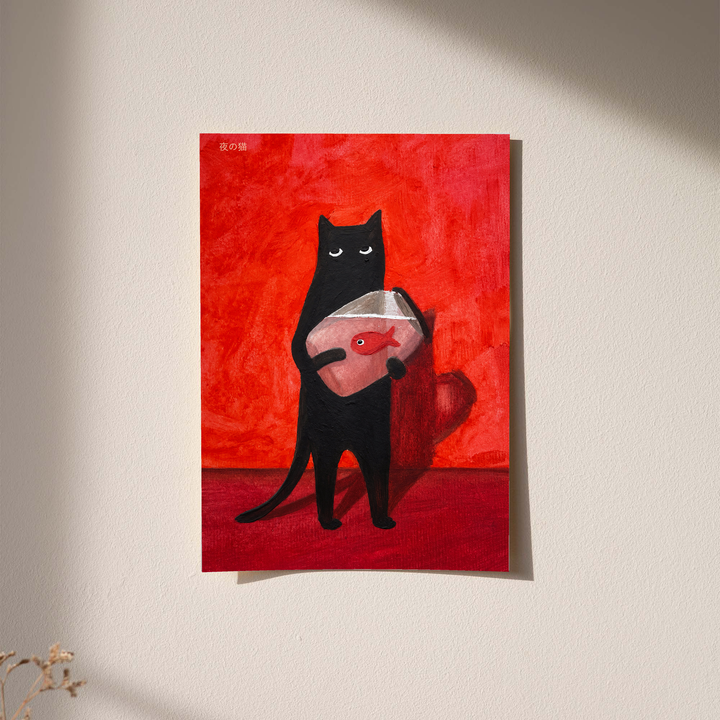 Black cat holding a fishbowl as an unframed print against a pale plaster wall with soft shadows