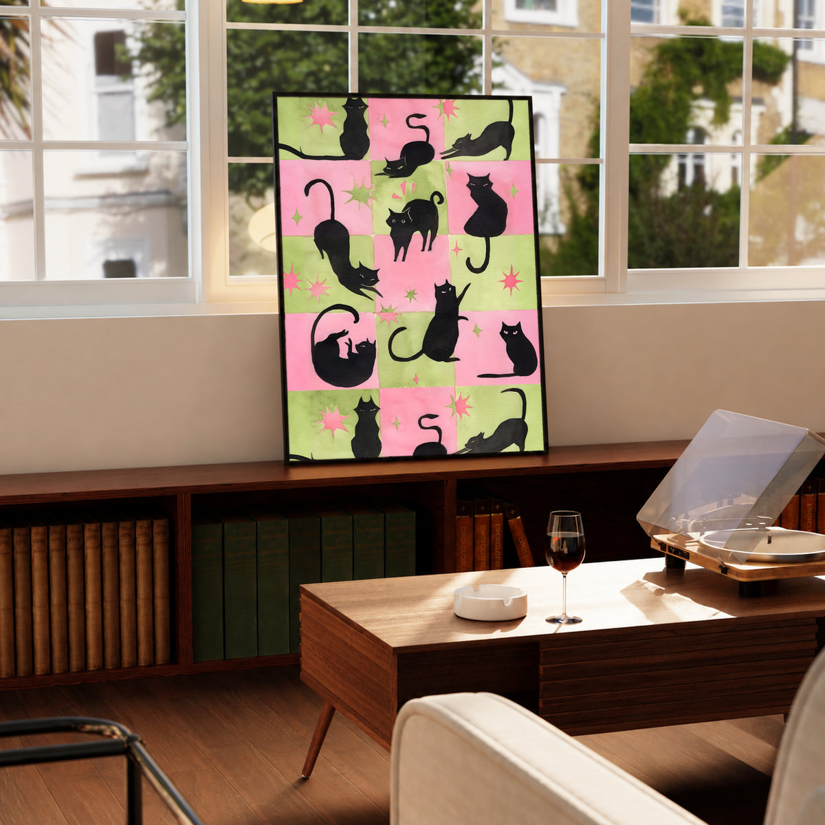 Cat silhouette framed poster with pink-and-green checkerboard layout and star details