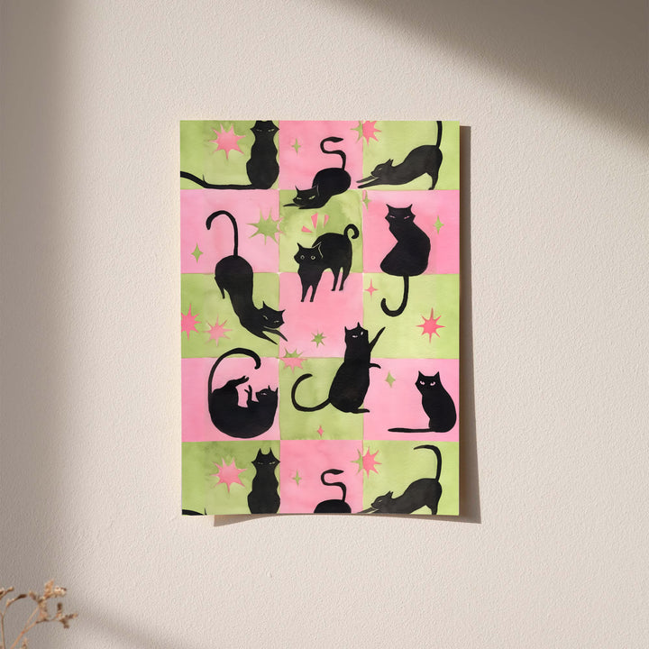 Framed cat silhouette wall art with pink and green checkerboard and star accents