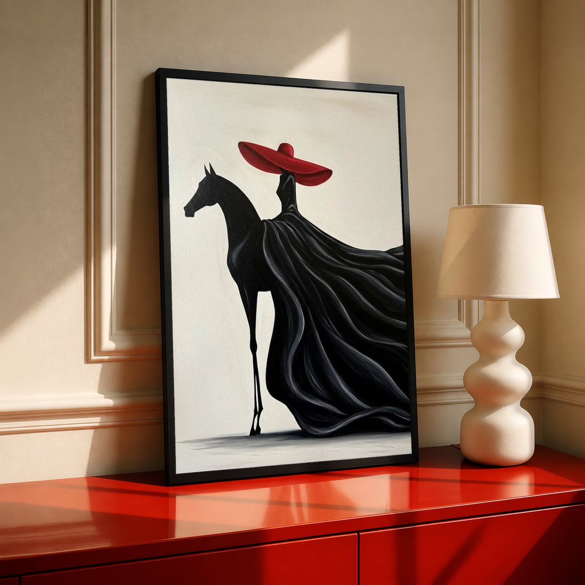 Black-framed art print featuring a black horse with a red hat and flowing black fabric