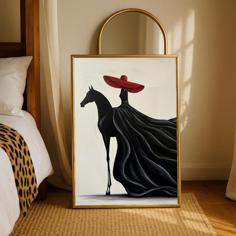 Gold-framed art print of a black horse with a red hat and flowing black mane
