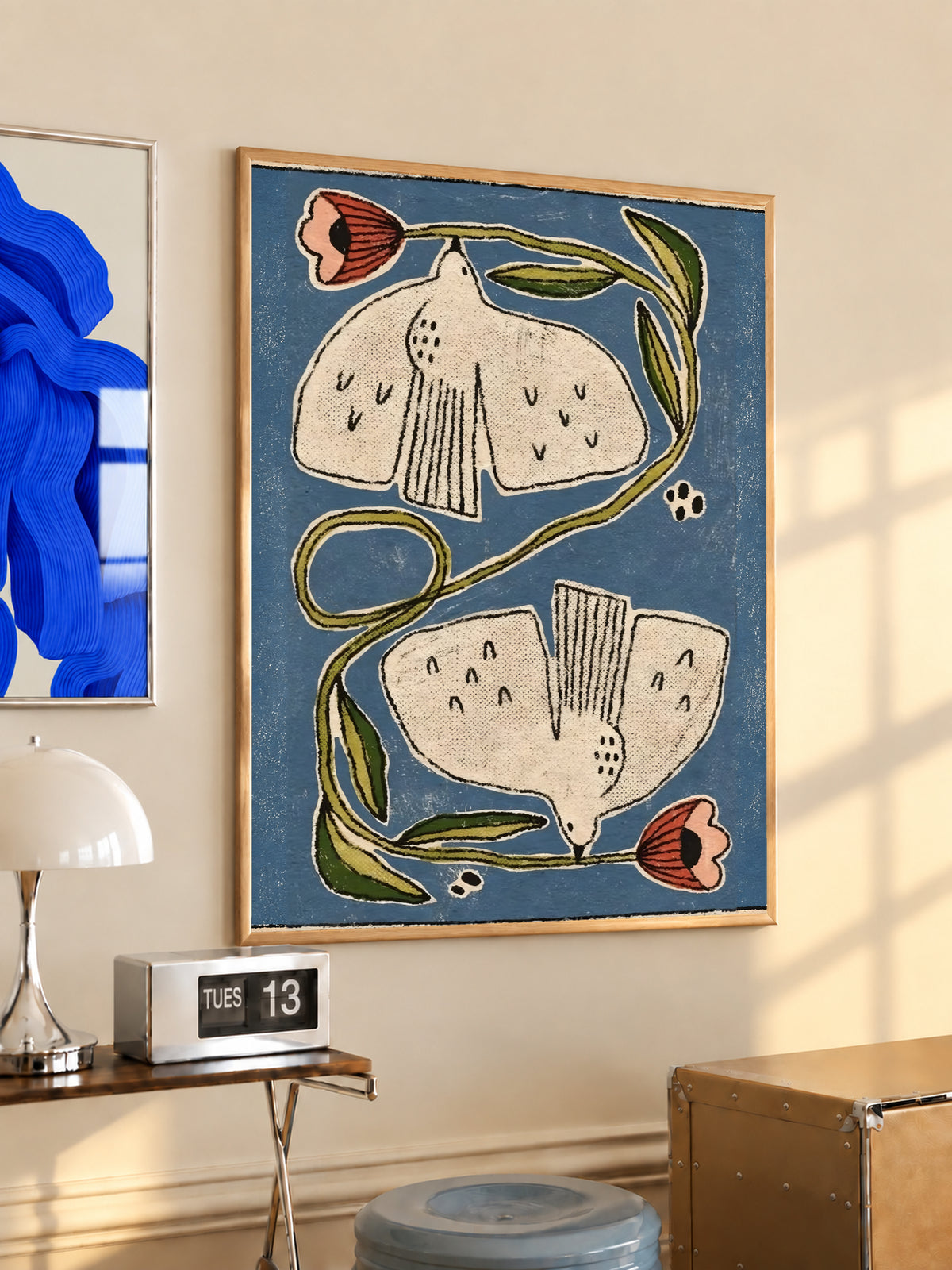 Close-up framed folk floral poster on blue: cream petals, coral buds, green curling stems